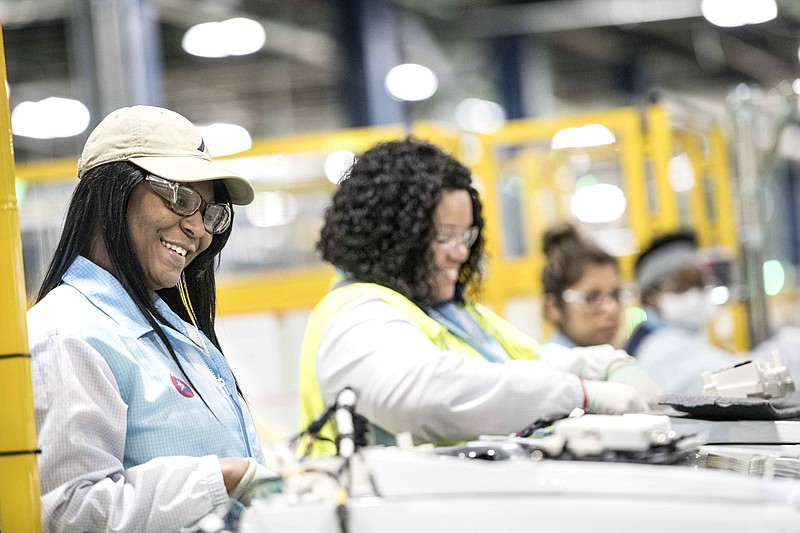 In this Friday, March 16, 2018 photo, Niesha Samuel works on the factory floor at the Samsung washing machine facility, in Newberry, S.C. The appliance manufacturer on Monday, March 19 announced the expansion of its production footprint in South Carolina, making progress on a plan to create nearly 1,000 by 2020.   (AP Photo/Sean Rayford)