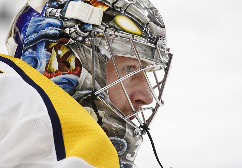 Nashville Predators goalie Pekka Rinne (35) looks on prior to an NHL hockey game against the Buffalo Sabres, Monday, March 19, 2018, in Buffalo, N.Y. (AP Photo/Jeffrey T. Barnes)