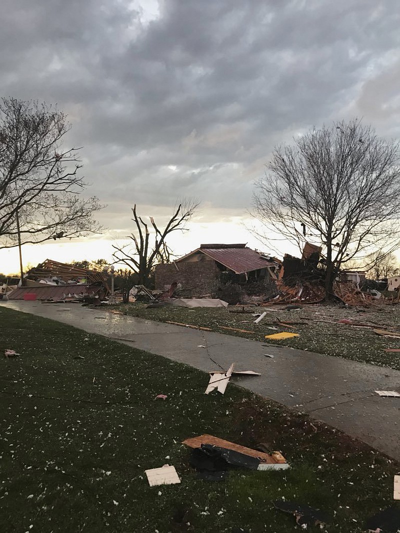 This photo provided by Johnny Tribble shows a damaged house after a tornado, Tribble said, passed the area in Ardmore, Ala., Monday, March 19, 2018. Severe storms that spawned tornadoes damaged homes and downed trees as they moved across the Southeast on Monday night. (Johnny Tribble via AP)