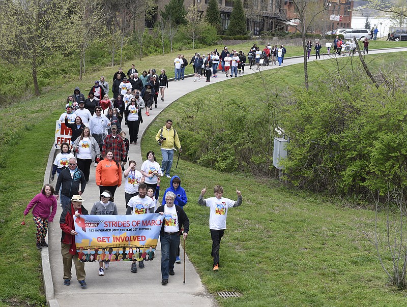 Walkers in a previous Strides of March in Renaissance Park. (Staff File Photo)