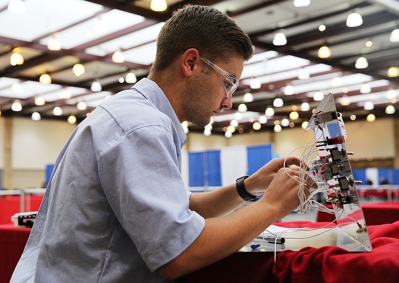 Hayden Settle, a Tennessee College of Applied Tech-Morristown, participates in an aerospace engineering competition during the Tennessee State Leadership and Skills Conference at the Chattanooga Convention Center on Tuesday, March 20, 2018 in Chattanooga, Tenn. There were 110 different SkillsUSA competitions going on during the event. 