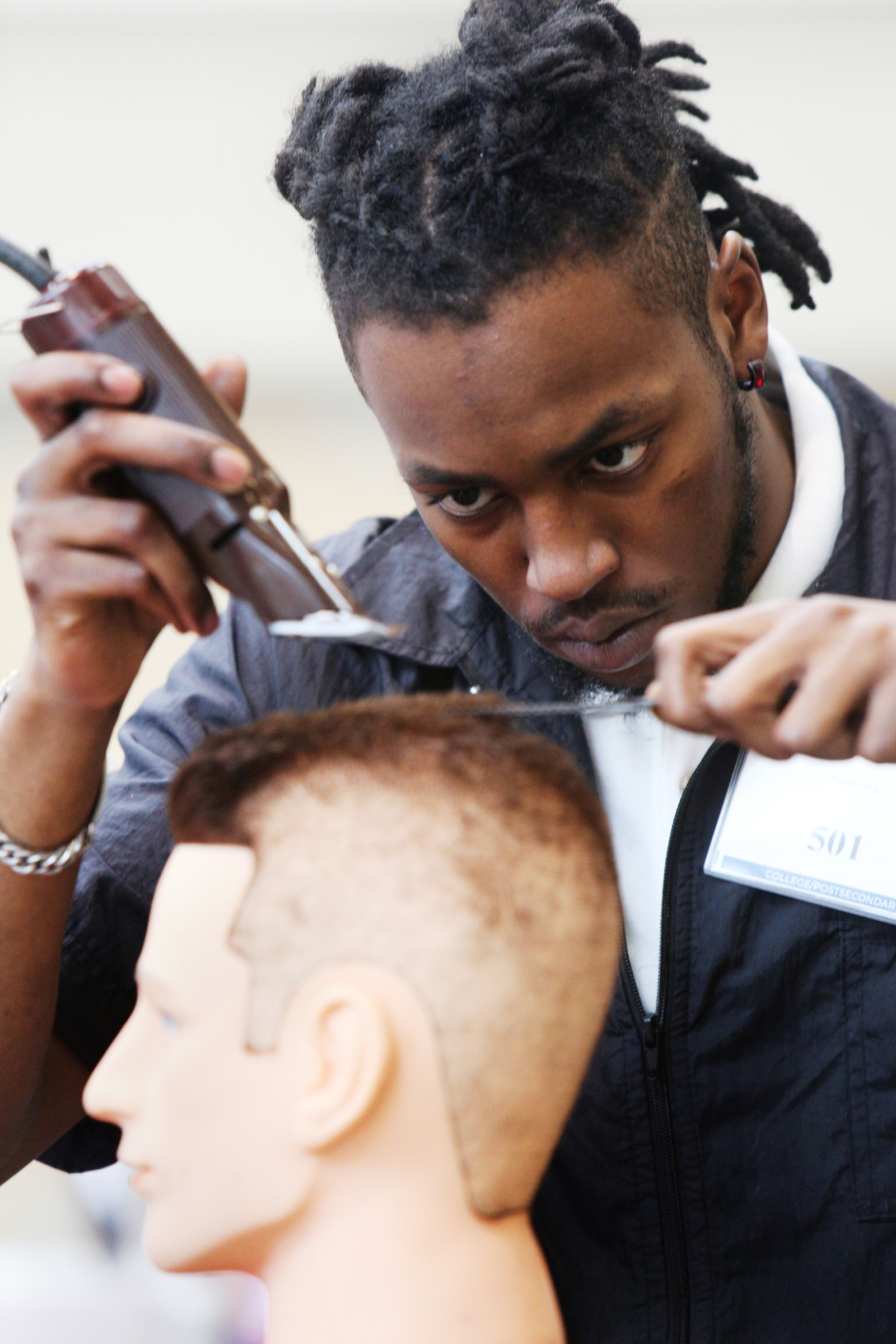 Brandon Long, a Tennessee College of Applied Technology-Paris student, participates in the barbering competition during the Tennessee State Leadership and Skills Conference at the Chattanooga Convention Center on Tuesday, March 20, 2018 in Chattanooga, Tenn. There were 110 different SkillsUSA competitions going on during the event.