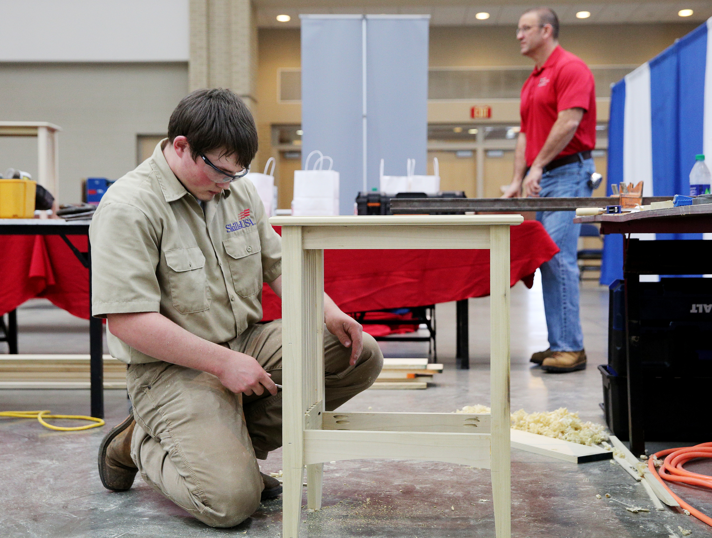Rusty Hembree, a Heritage High School student, participates in a cabinet construction competition during the Tennessee State Leadership and Skills Conference at the Chattanooga Convention Center on Tuesday, March 20, 2018 in Chattanooga, Tenn. A variety of competitions, including cosmetology, carpentry, graphic design and more, were held during the event with the winners advancing to a national competition.