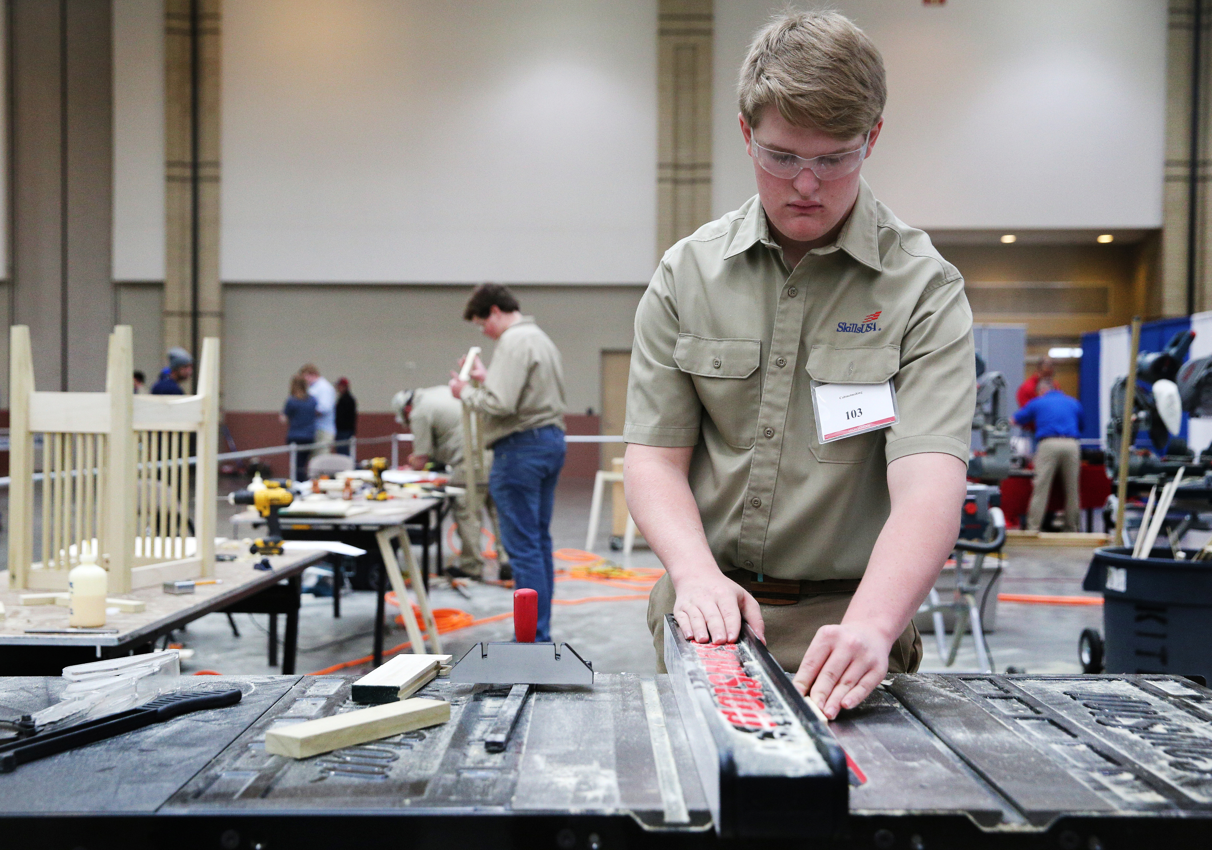 Jude Hassell, a Lebanon High School student, participates in a cabinet construction competition during the Tennessee State Leadership and Skills Conference at the Chattanooga Convention Center on Tuesday, March 20, 2018 in Chattanooga, Tenn. A variety of competitions, including cosmetology, carpentry, graphic design and more, were held during the event with the winners advancing to a national competition.