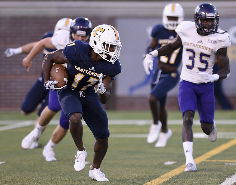 UTC defensive back Brandon Dowdell (17) returns a punt against Western Carolina at Finley Stadium on Saturday, Sept. 30, in Chattanooga, Tenn.