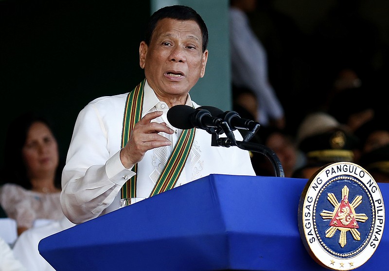 
              President Rodrigo Duterte addresses the troops during the 121st anniversary celebration of the Philippine Army Tuesday, March 20, 2018, in Taguig city, east of Manila, Philippines. (AP Photo/Bullit Marquez)
            