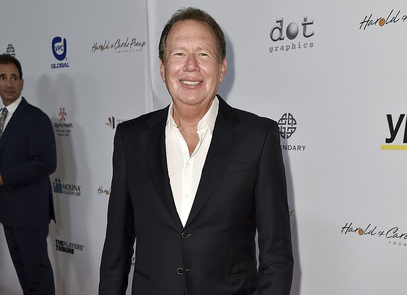 FILE - In this Aug. 7, 2015 file photo, Garry Shandling arrives at the 15th Annual Harold and Carole Pump Foundation Gala in Los Angeles. Judd Apatow has decided to memorialize his friend and mentor Shandling in an appropriate way. Apatow made Shandling the subject of his four-hour HBO documentary called “The Zen Diaries of Garry Shandling.” The new film draws on 30 years of Shandling’s intimate diaries and notes. (Photo by Rob Latour/Invision/AP, File)