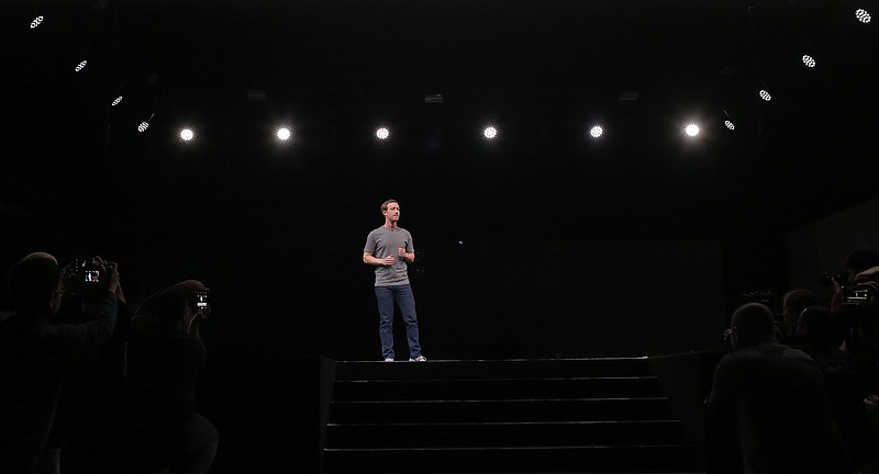 FILE- In this Feb. 21, 2016, file photo, Facebook CEO Mark Zuckerberg speaks during the Samsung Galaxy Unpacked 2016 event in Barcelona, Spain. Breaking more than four days of silence, Zuckerberg admitted mistakes and outlined steps to protect user data in light of a privacy scandal involving a Trump-connected data-mining firm. Zuckerberg posted on his Facebook page Wednesday, March 21, 2018, that Facebook has a "responsibility" to protect its users' data. (AP Photo/Manu Fernadez, File)