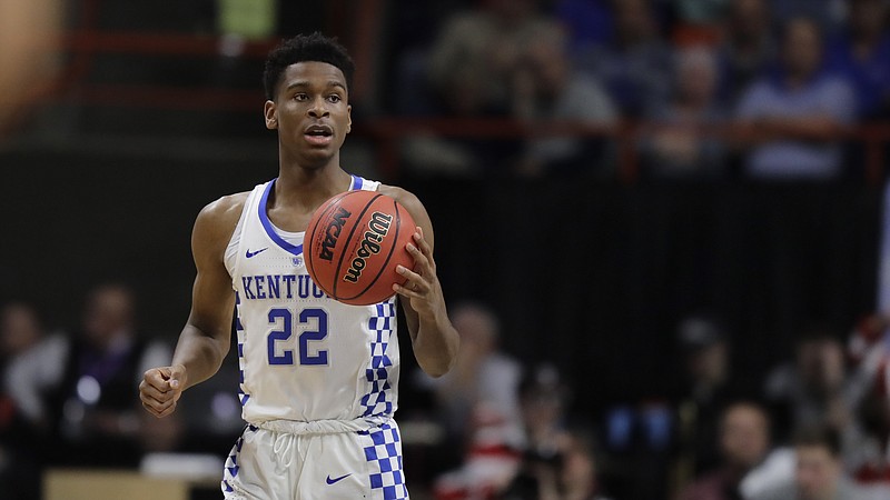 Kentucky guard Shai Gilgeous-Alexander moves the ball against Davidson during a first-round game in the NCAA men's college basketball tournament Thursday, March 15, 2018, in Boise, Idaho. Kentucky won 78-73. (AP Photo/Ted S. Warren)