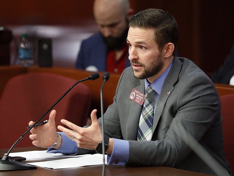 In this Feb. 13, 2018, file photo, State Rep. David Clark presents his bill as the Medical Cannabis Working Group meeting got underway in Atlanta. Medical marijuana advocates expressed outrage Monday, March 19 over the apparent stalling of a proposal that would expand Georgia's medical cannabis oil program to include those with post-traumatic stress disorder or chronic, intractable pain. Clark, the bill's sponsor, accused Lt. Gov. Casey Cagle, a leading Republican gubernatorial candidate and the president of the Senate, of "playing politics" and stifling the proposal by instead calling for another study committee on medical marijuana. (Bob Andres /Atlanta Journal-Constitution via AP, File)