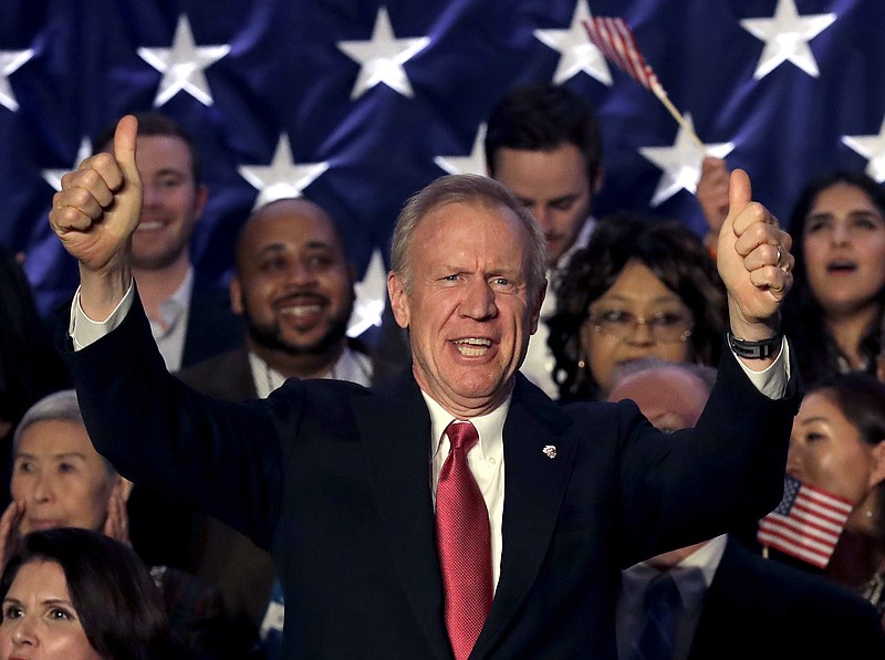 Illinois Republican Gov. Bruce Rauner addresses the crowd on primary election night, Tuesday, March 20, 2018, in Chicago. Rauner has won the Republican nomination for a second term, and will face Democratic gubernatorial candidate J.B. Pritzker in the general election. (AP Photo/Nam Y. Huh)