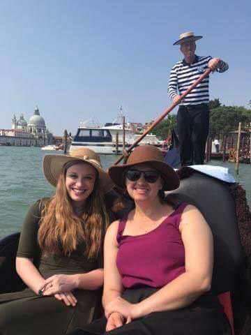 Carson Cook enjoys a gondola ride through Venice, Italy, with Bekah Carey, one of the many friends she made abroad.