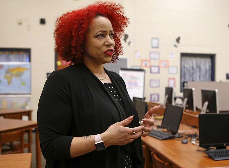 Nikole Hannah-Jones speaks with a local television station during a media availability before speaking at a UnifiEd event at Orchard Knob Elementary School on Thursday, March 22, 2018 in Chattanooga, Tenn.