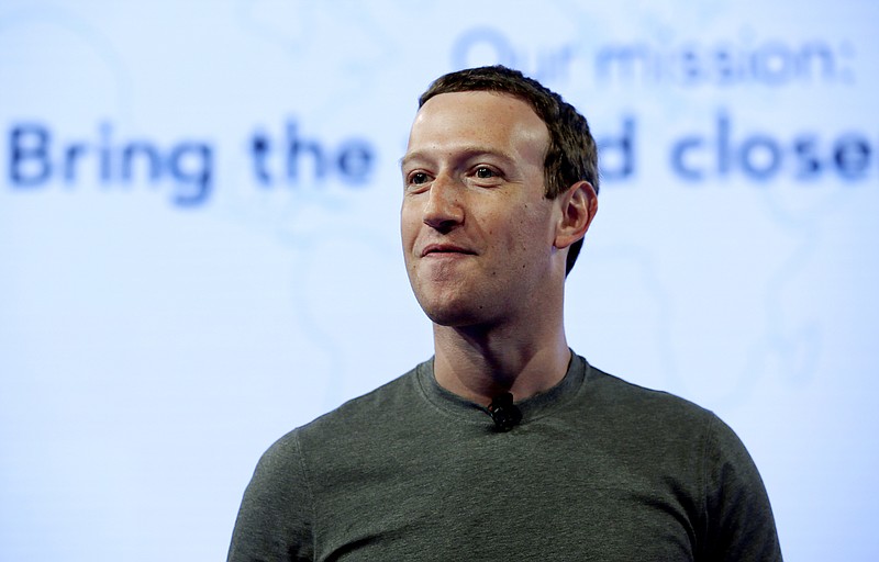 In this June 21, 2017, file photo, Facebook CEO Mark Zuckerberg speaks during preparation for the Facebook Communities Summit, in Chicago. Zuckerberg embarked on a rare media mini-blitz Wednesday, March 22, 2018, in the wake of a privacy scandal involving a Trump-connected data-mining firm. (AP Photo/Nam Y. Huh, File)