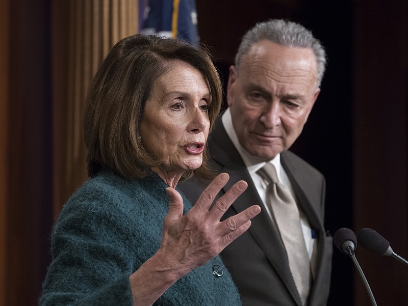 House Minority Leader Nancy Pelosi, D-Calif., and Senate Minority Leader Chuck Schumer, D-N.Y., speak to reporters about the massive government spending bill moving through Congress, on Capitol Hill in Washington, Thursday, March 22, 2018. The bipartisan $1.3 trillion spending bill pours huge sums into Pentagon programs and domestic initiatives ranging from building roads to combatting the nation's opioid abuse crisis, but left Congress in stalemate over shielding young Dreamer immigrants from deportation and curbing surging health insurance premiums. (AP Photo/J. Scott Applewhite)