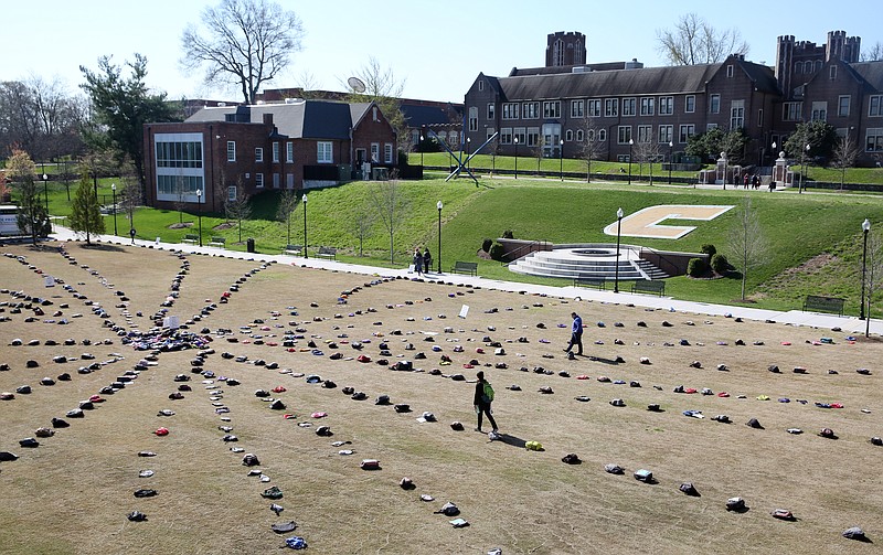 Over 1,000 backpack are scattered across the lawn for an Active Minds demonstration at the University of Tennessee at Chattanooga on Thursday, March 22, 2018 in Chattanooga, Tenn. Some backpacks included belongings of suicide victims and some contained letters with information about those college students. 