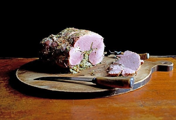 Southern Maryland stuffed ham, filled with kale, cabbage and lots of pepper, is one of America's most regionally specific dishes. It has never ventured much past St. Mary's County on Chesapeake Bay. (Credit: Andrew Scrivani for The New York Times)