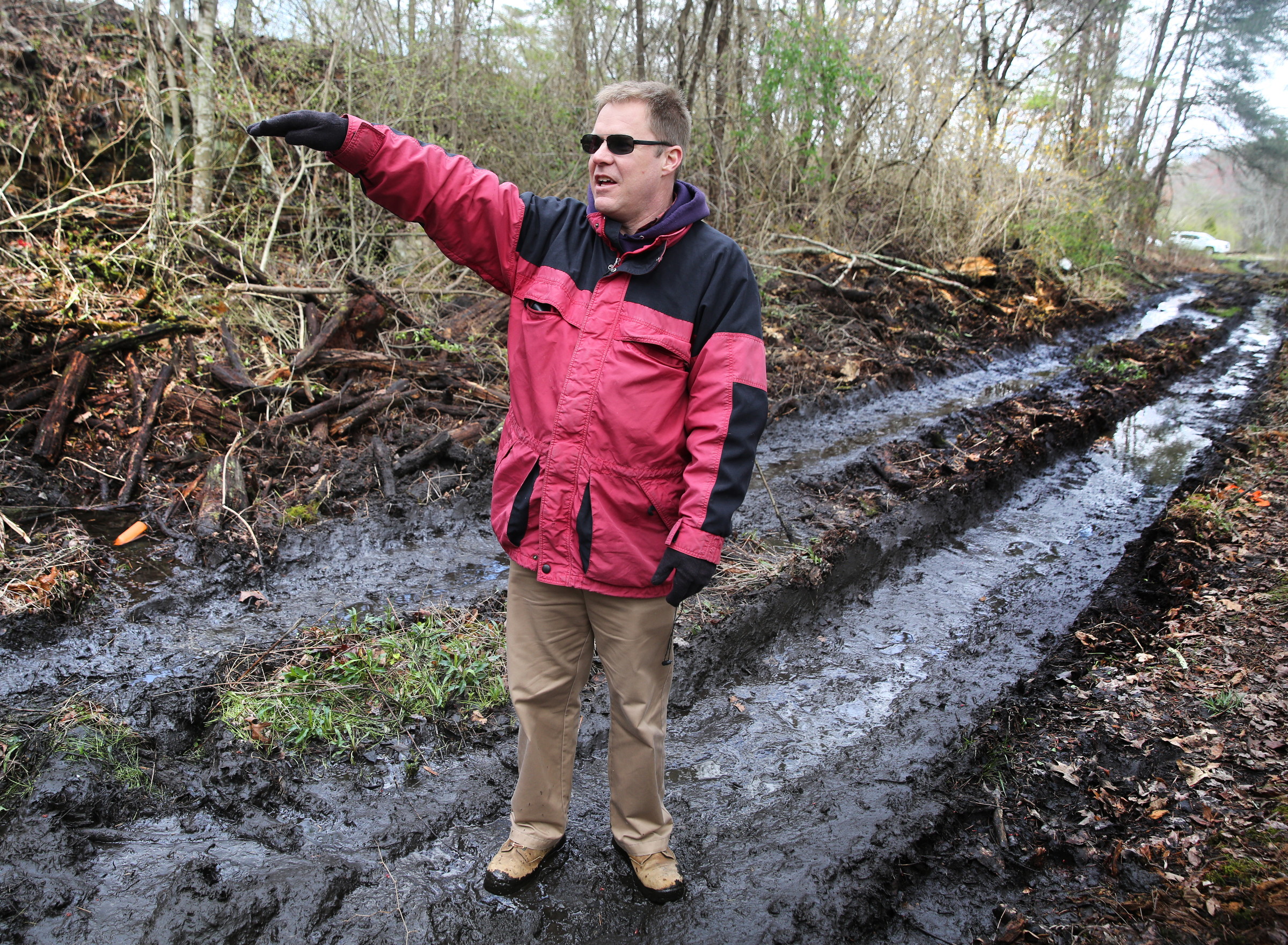 Lawson Bordley of Robert G. Campbell engineering firm points out features along portions of the Mountain Goat Trail Wednesday, March 21, 2018 in Tracy City, Tenn. The multi-use walking and cycling trail will eventually link seven towns in Grundy and Franklin counties.