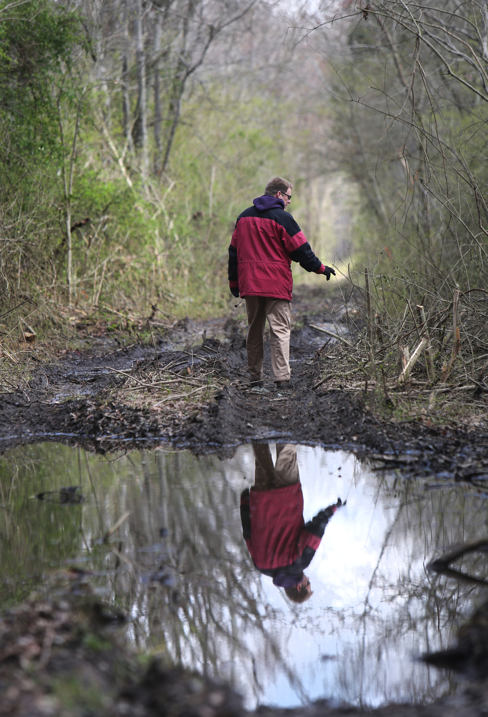 Lawson Bordley of Robert G. Campbell engineering firm points out features along portions of the Mountain Goat Trail Wednesday, March 21, 2018 in Tracy City, Tenn. The multi-use walking and cycling trail will eventually link seven towns in Grundy and Franklin counties.