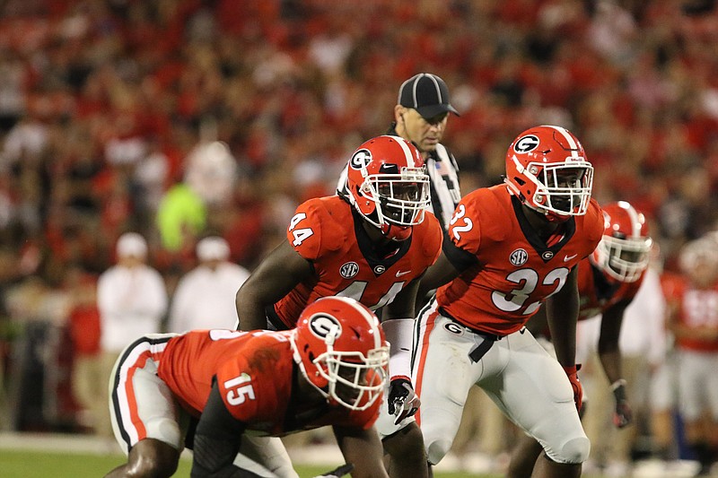 Juwan Taylor (44) and Monty Rice (32) are in the mix to get significant playing time this year for Georgia at inside linebacker, a position left vacant by Butkus Award winner Roquan Smith.