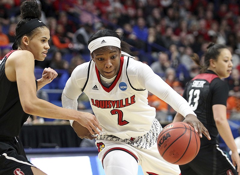 Louisville's Myisha Hines-Allen (2) drives on Stanford's Kaylee Johnson during the first half of an NCAA women's college basketball tournament regional semifinal Friday, March 23, 2018, in Lexington, Ky. (AP Photo/James Crisp)

