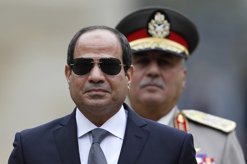  In this Oct. 24, 2017, file photo, Egyptian President Abdel-Fattah el-Sissi attends a military ceremony in the courtyard at the Hotel des Invalides in Paris, France. On March 26-28, 2018 a Presidential election will be held in Egypt, with el-Sissi virtually guaranteed to win. (Charles Platiau, Pool via AP, File)