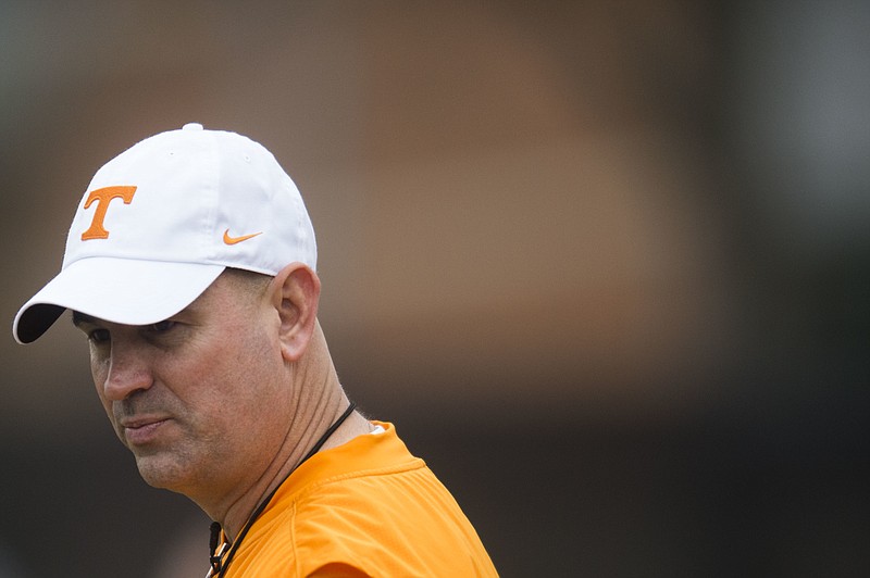 Tennessee head coach Jeremy Pruitt walks on the field during the first day of spring NCAA college football practice, Tuesday, March 20, 2018 in Knoxville, Tenn. (Caitie McMekin/Knoxville News Sentinel via AP)