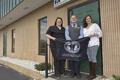 The new Total Health Chiropractic office at 400 S. Moore Road in East Ridge will be staffed, from left, by Michelle Shadwick, a Chiropractic Assistant, and chiropractors Dr. Chris Catalfoand Dr. Hannah Hackett.