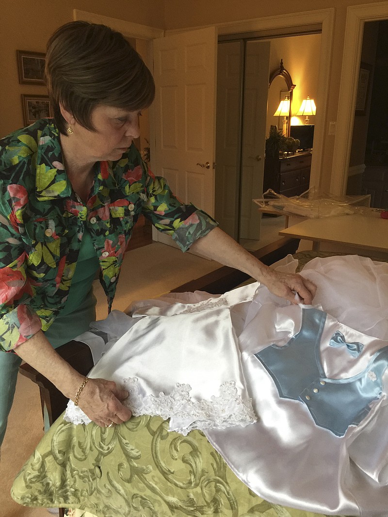 Kay Wallace, of Signal Mountain. sews “angel gowns” for infants who have passed away.


