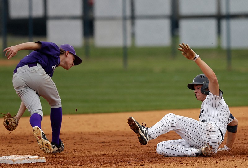 Gordon Lee runner McCain Barbee steals 2nd on a wild throw to Darlington shortstop Trey Yunger during their prep baseball game at Gordon Lee High School on Wednesday, March 28, 2018, in Chickamauga, Ga. 