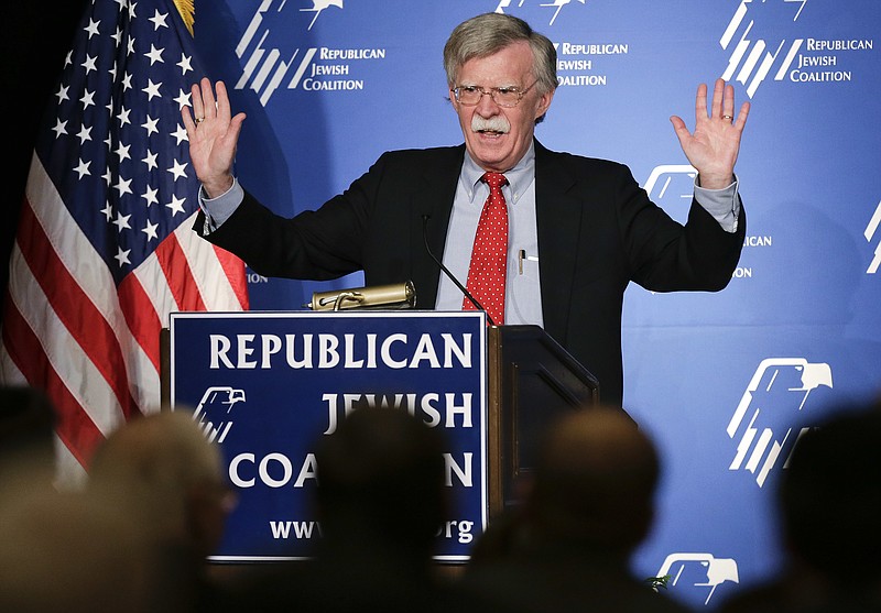 In this March 29, 2014, file photo, former U.S. ambassador to the U.N. John Bolton speaks at the Republican Jewish Coalition in Las Vegas. President Donald Trump's pick of Bolton for his next national security adviser stirred up the same burning question Friday in Washington as in anxious foreign capitals: Just how much will his hawkish, confrontational approach rub off on Trump? (AP Photo/Julie Jacobson, File)