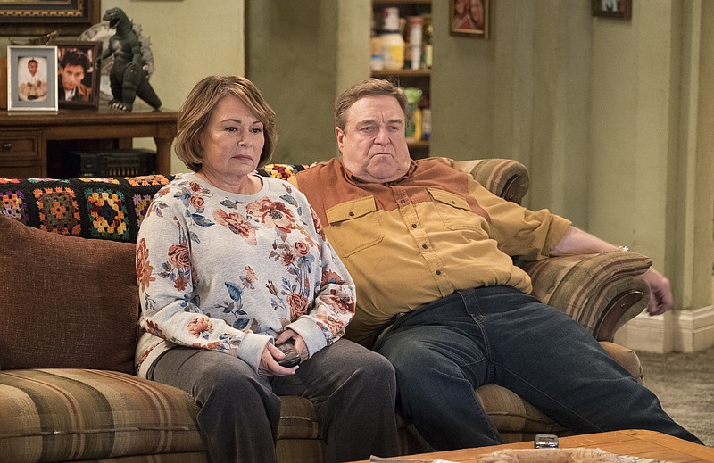 In this image released by ABC, Roseanne Barr, left, and John Goodman appear in a scene from the reboot of "Roseanne," premiering on Tuesday at 8 p.m. EST. For the reboot, Roseanne will be at odds with her sister Jackie, played by Laurie Metcalf, over President Donald Trump. Barr said she thought it was important to show how the Conner family deals with the same issues many American families are facing. (Adam Rose/ABC via AP, File)