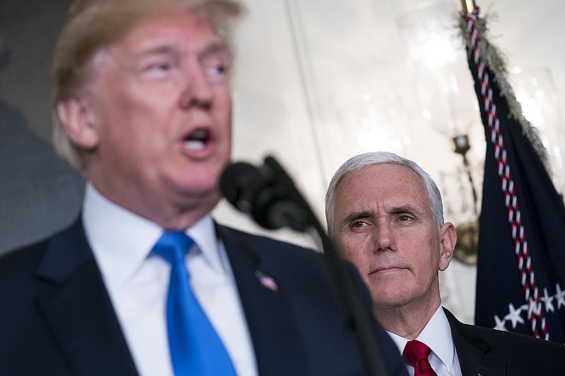 Vice President Mike Pence looks on as President Donald Trump announces about $60 billion worth of annual tariffs on Chinese imports a few weeks ago. (Doug Mills/The New York Times)