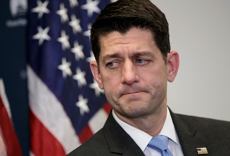 FILE - In this March 20,2018, file photo, House Speaker Paul Ryan of Wis., pauses as he speaks to reporters on Capitol Hill in Washington. Ryan’s political future as House speaker has been such a topic of speculation that even the simple question of whether he will seek re-election to his Wisconsin seat remains secret.  (AP Photo/J. Scott Applewhite, File)