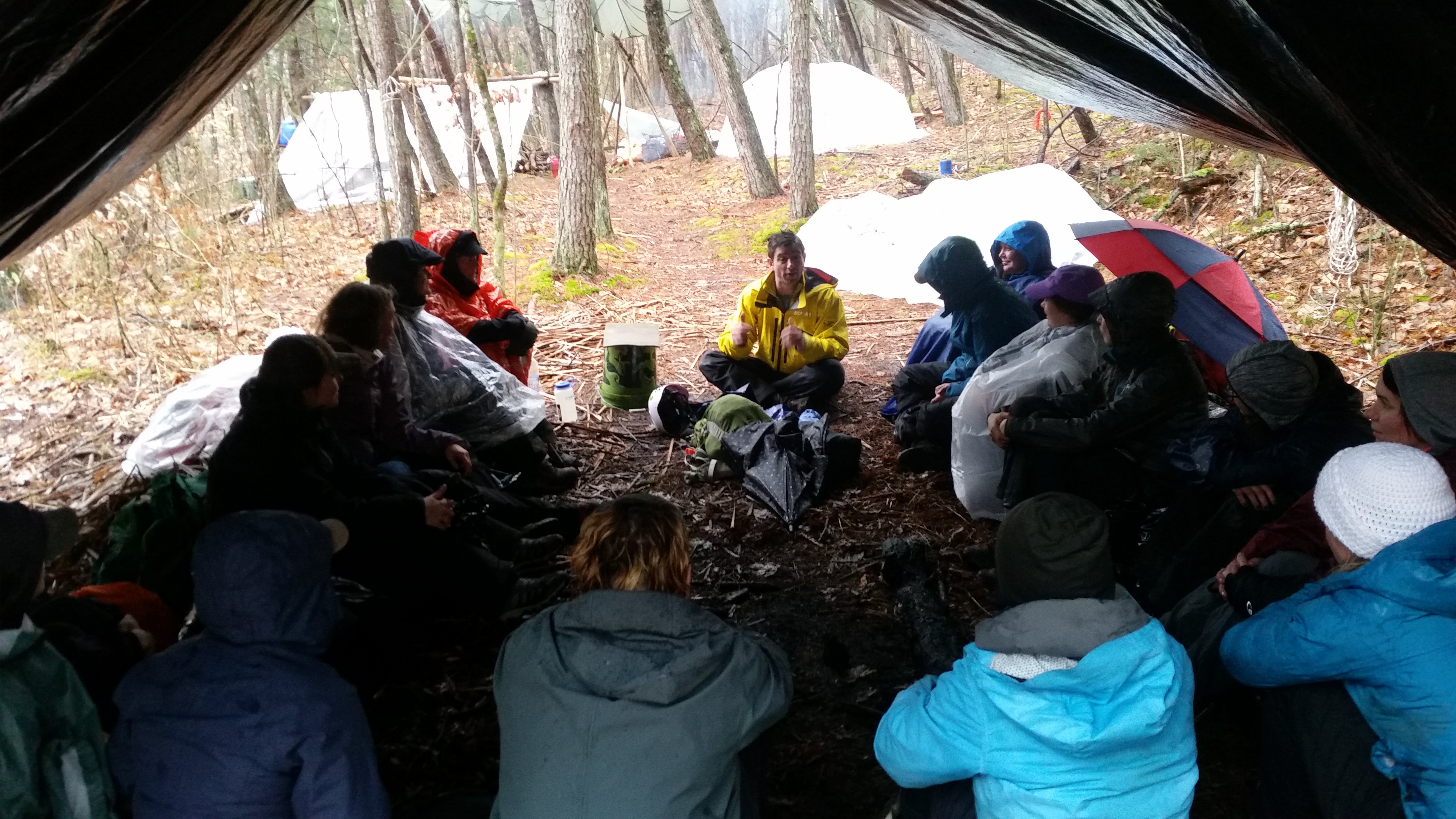 Search and rescue ranger John Sharbel leads a lecture from beneath a makeshift tent. Photo by Andrew Herrington