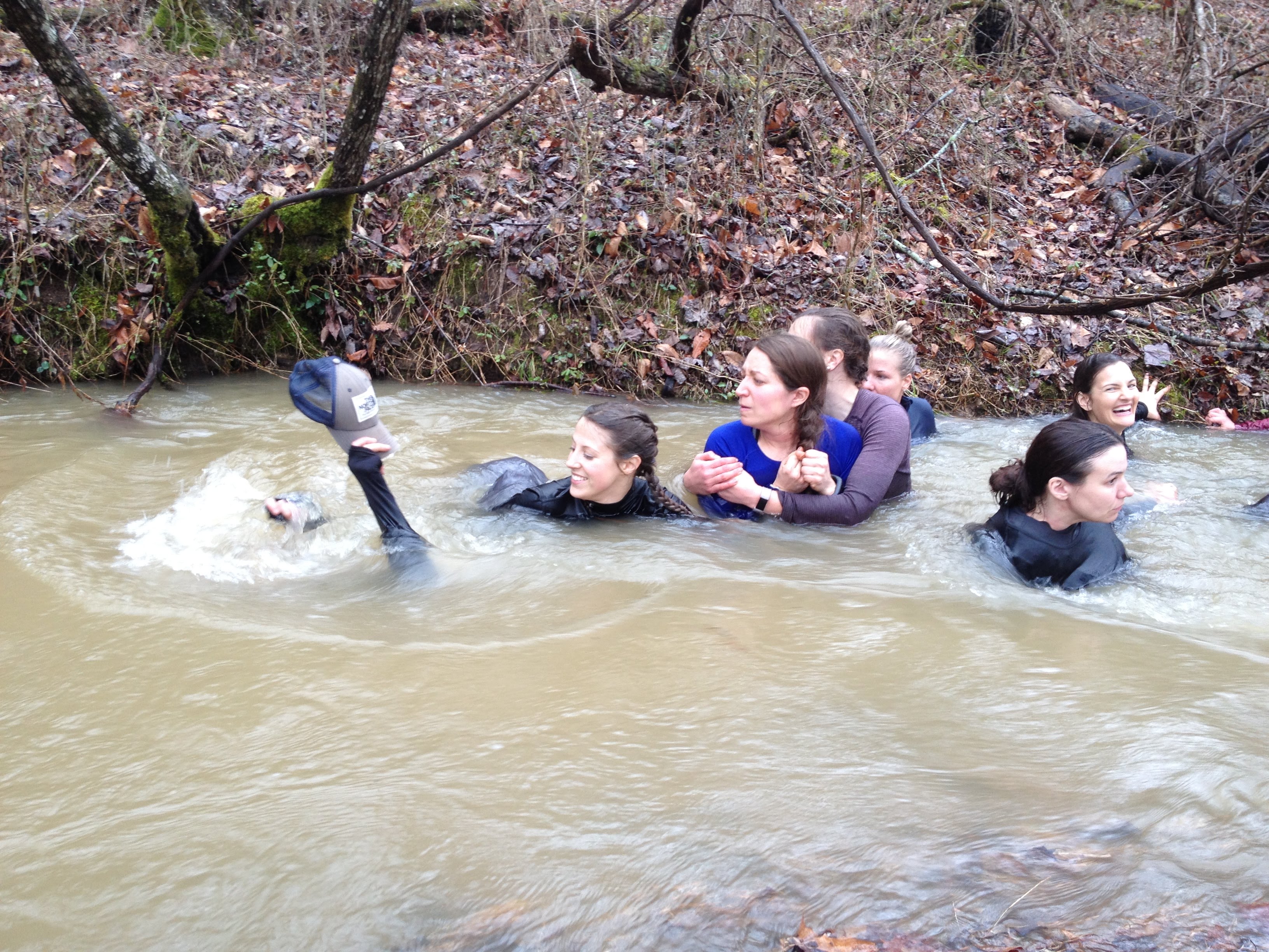 One by one, the women submerged themselves completely. The objective was first, to teach breathing techniques, and second, to teach fire-building with a wet lighter and starter. Photo by Carol Hesse