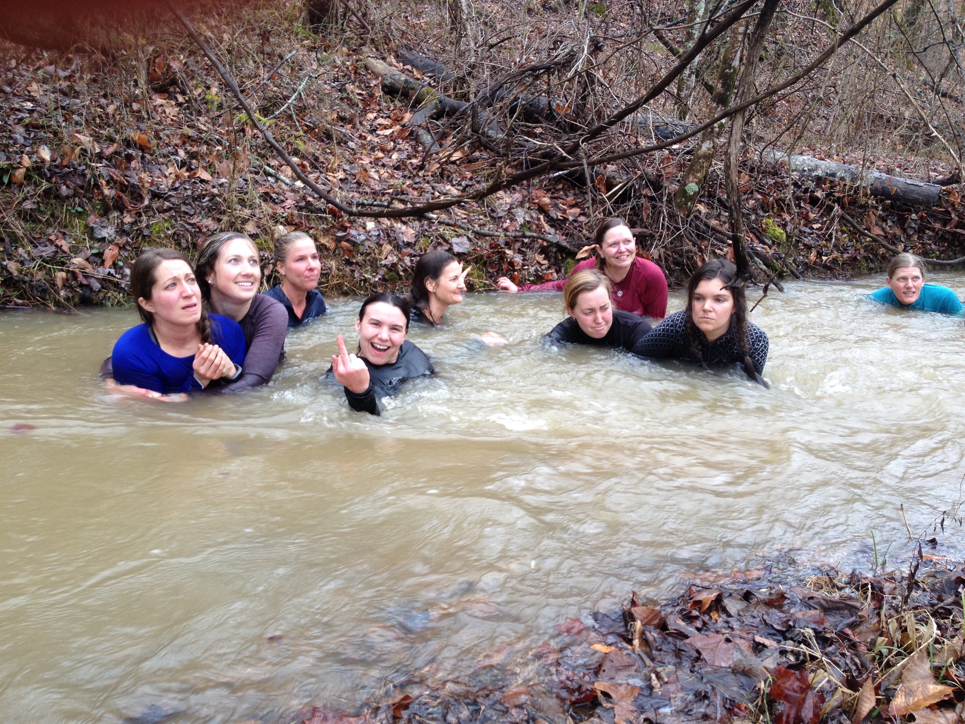 A cold water immersion drill closed out the weekend, when the participants submerged themselves in a frigid, flooded branch. Photo by Carol Hesse