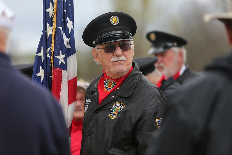 Vietnam Veterans of America Chapter 203 Honor Guard member Denney Miller waits for the Vietnam Veterans Appreciation and Memorial Service to begin at the Chattanooga National Cemetery Friday, March 30, 2018 in Chattanooga, Tenn. The ceremony concluded with the placement of an individual United States flag on each of the 35 graves of the men who died in the Republic of South Vietnam. 