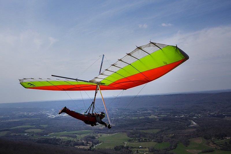 Hang glider Mike Potrin takes off from the bluff at Lookout Mountain Hang Gliding on Friday, March 16, 2018, in Rising Fawn, Ga. Chattanooga has grown to be one of the most popular hang-gliding destinations in the country.