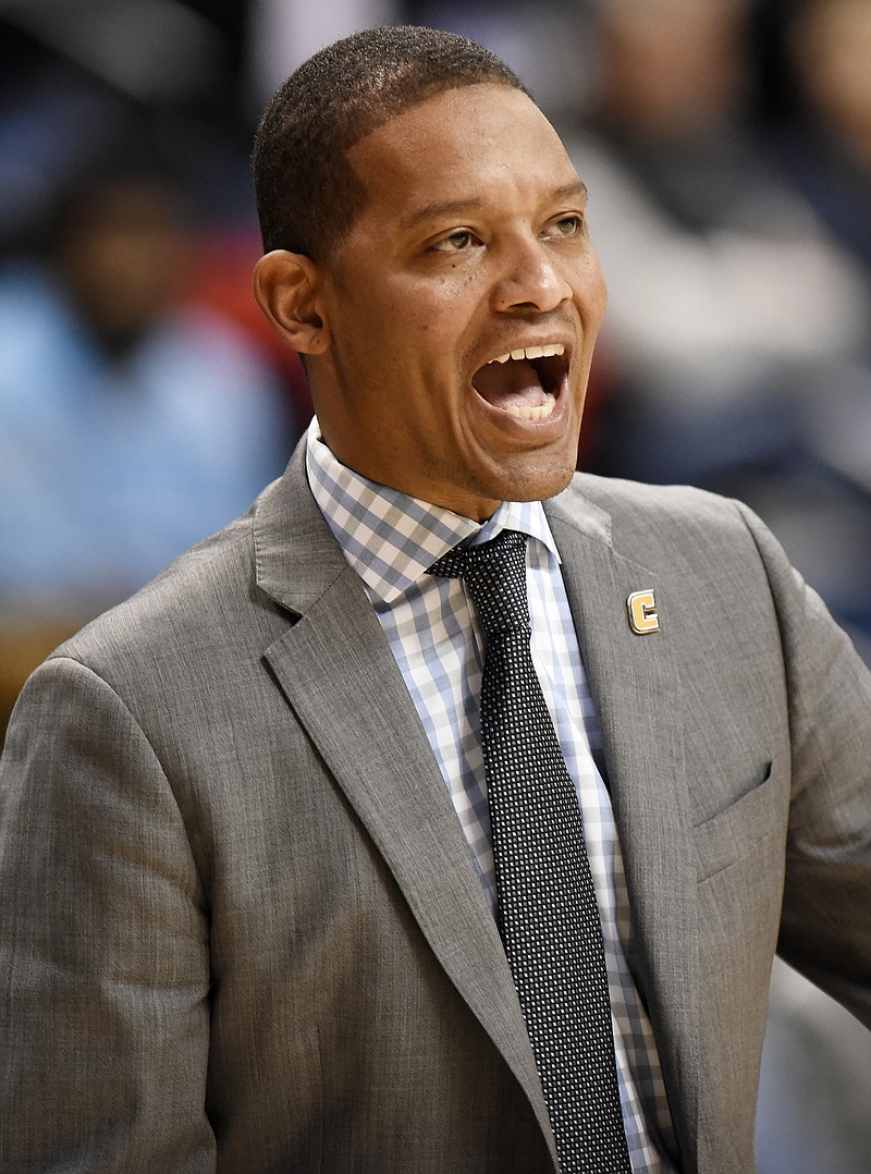 UTC head coach Lamont Paris shouts instructions to his team.  The Wofford Terriers visited the Chattanooga Mocs in Southern Conference basketball action at McKenzie Arena on February 17, 2018.  