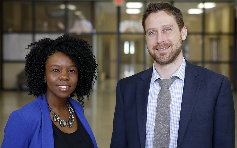 Community School Coordinators Mellisa Graham, left, and John Cunningham pose at Orchard Knob Middle School on Thursday, March 29, 2018 in Chattanooga, Tenn.