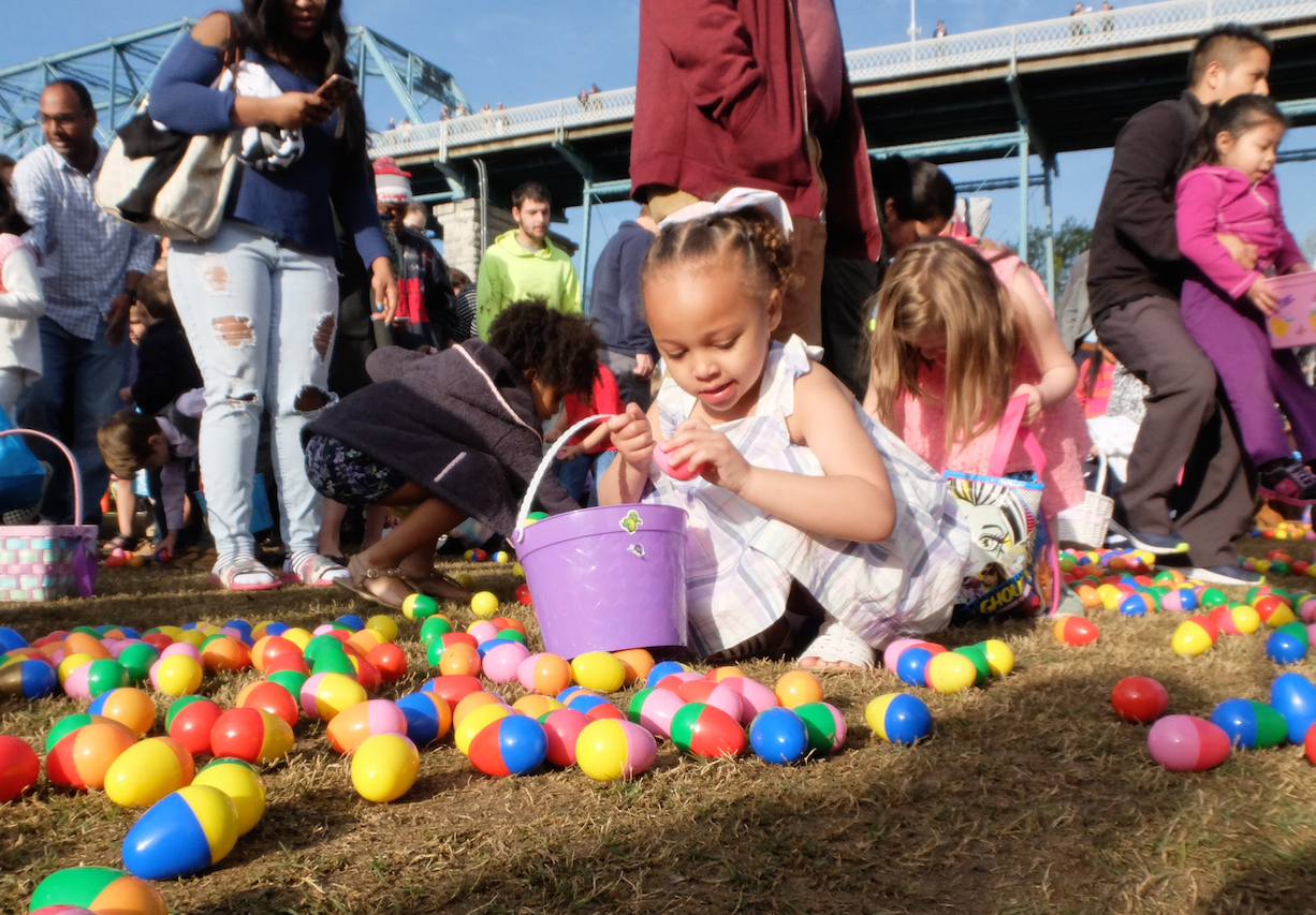 Choosy About Eggs -- Kaldynce Earvin inspects the first egg she chose Sunday morning during the Easter at Coolidge egg hunt.
