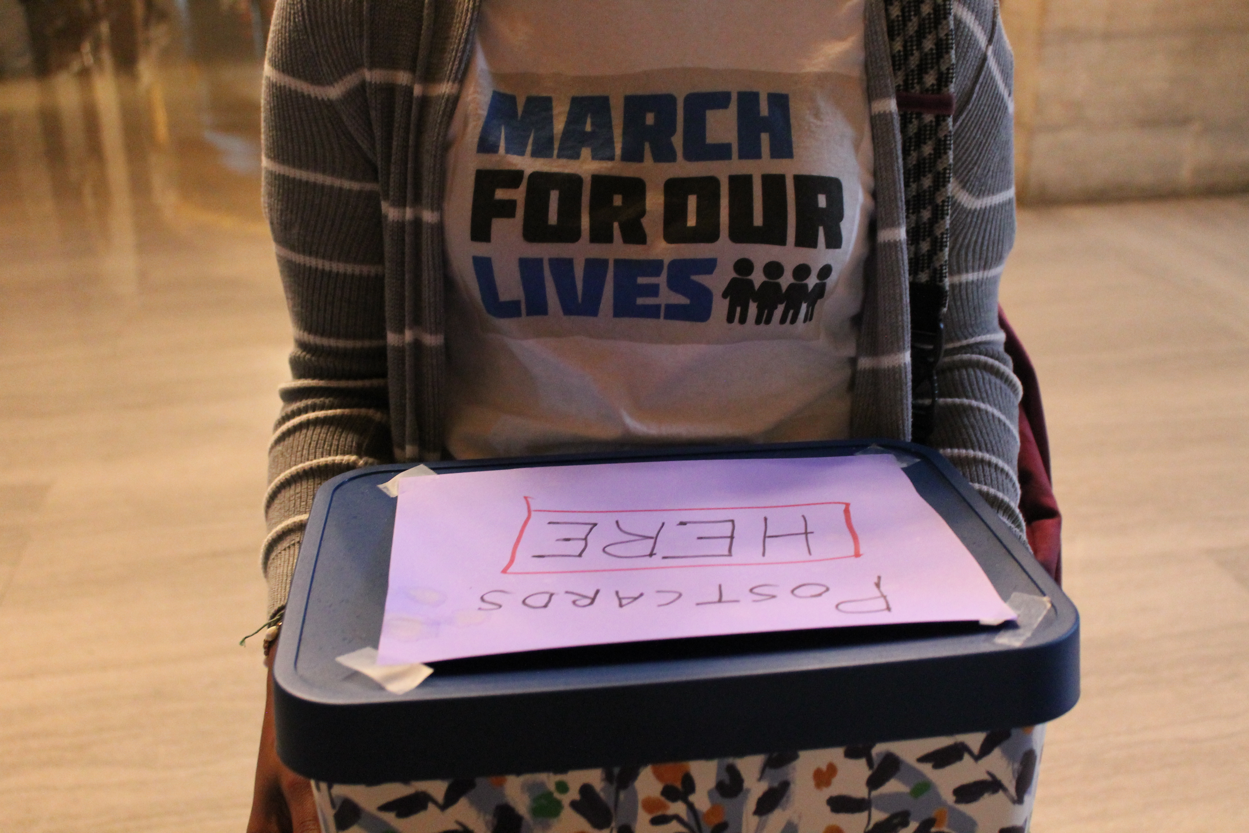 Lauren Tolbert, a junior at Chattanooga School for Arts and Sciences, and a member of Chattanooga Students Leading Change, carries a box of more than 600 handwritten postcards and letters from Chattanooga students and community members through the state Capitol on Monday, April 2. The group, CSLC, organized the local March for Our Lives rally last month and continues to lobby elected officials to enact laws that will curb gun violence in schools and communities.