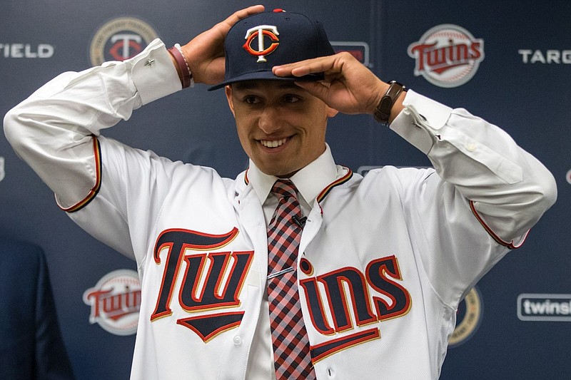 Royce Lewis, the top overall pick in last year's Major League Baseball draft, smiles after being introduced in a news conference by the Minnesota Twins.