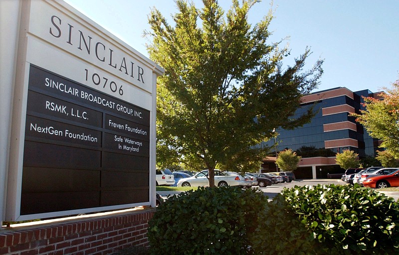 In this Tuesday, Oct. 12, 2004, file photo, Sinclair Broadcast Group, Inc.'s headquarters stands in Hunt Valley, Md. President Trump is jumping to the defense of the Sinclair Broadcast Group, which is under fire following the rapid spread of a video showing anchors at its stations across the country reading a script criticizing "fake" news stories. Trump tweeted Monday, April 2, 2018, that it was funny to watch "Fake News Networks" criticizing Sinclair for being biased. (AP Photo/Steve Ruark, File)