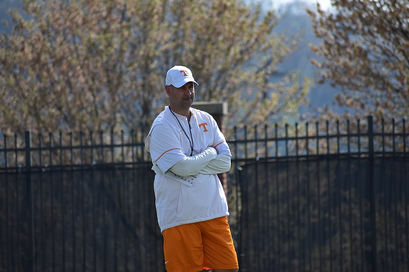 Jeremy Pruitt watches Tennessee's linebackers go through a drill during practice on April 3.
