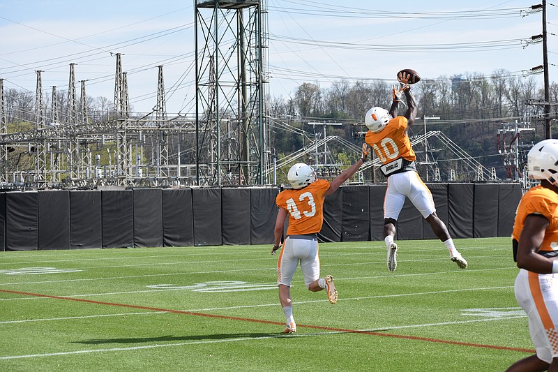 Defensive back Tyler Byrd (10) leaps for an interception during Tennessee's practice on April 3. Photo by David Cobb
