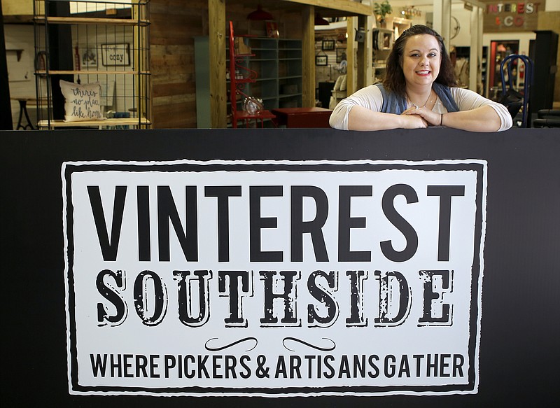 Owner Katherine Schurer poses at Vinterest Antiques' new location on the Southside on Wednesday, April 4. Vinterest Southside will celebrate its grand opening this Friday at 10 a.m. at the new location on Chestnut Street. The first 25 shoppers will receive door prizes, and Schurer said they will also be giving away gift cards every 30 minutes until they close at 7 p.m.