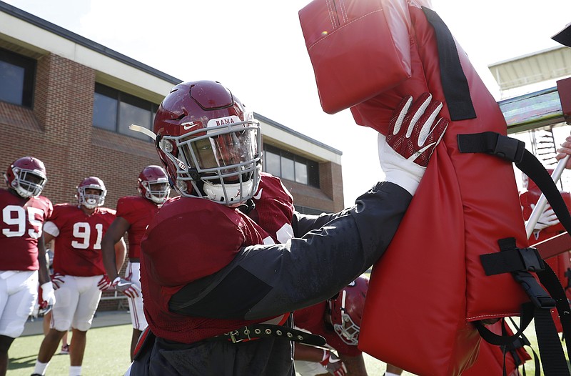 Alabama senior defensive lineman Isaiah Buggs works through a drill during a recent spring practice in Tuscaloosa. (Photo: Robert Sutton)
