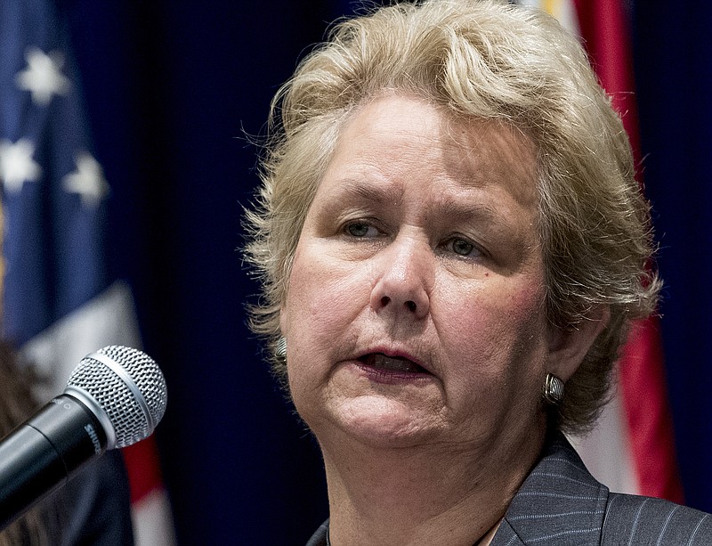 Supernumerary District Attorney Ellen Brooks arrives to give a report to the media on the investigation into former governor Robert Bentley at a news conference in the Attorney General's office in Montgomery, Ala. on Wednesday April 4, 2018. A grand jury has closed an investigation surrounding Gov. Robert Bentley and others without indictments, but with an urging to strengthen gaps in the ethics law that hindered bringing charges, Brooks announced Wednesday. (Mickey Welsh/The Montgomery Advertiser via AP)